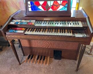 Vintage Wurlitzer organ with recording capability.