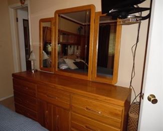 Three fold mirror atop and beautiful long dresser