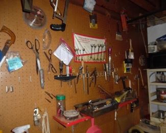 Handtools, pegboard, and hangers, lots and lots of tools to be had