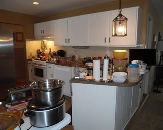 Who would have thought that this kitchen could hold so much cookware and bakeware
