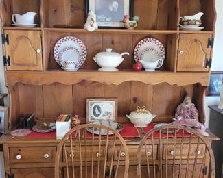 Another larger cabinet or hutch, matches the table and chairs