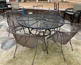 #69	Wrought Iron Round Table w/4 chairs - 48"D	 $100.00 
