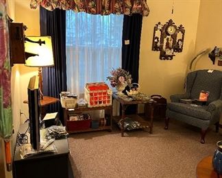 Polaroid Flat Screen TV; TV Stand; Records; CD’s; Cassettes; Media Stand; Draperies; Chair; End Table; Glass Ashtrays; Decor