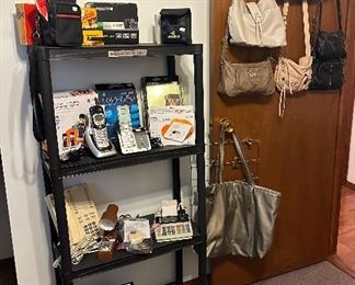 Purses; Canon Sure Shot 76 Zoom; Kodak Instamatic X-45 Color Outfit; Fuji Fine Pixs 7000; Pentax PC-50; Binoculars; Gemini Caller ID; AT&T 3 Handset Cordless Aswering System; At&T Answering System; Uniden Cordless Phone; AT&T Flip Phones; Sharp Calculator EL-1801AII; Emerson Coin Counter