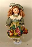 Porcelain Girl Doll on Stand with Golden Curly Hair and Hand painted Dress