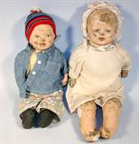 Vintage Baby Dolls
(Qty.2) One 13"Tall. Wearing Jean Jacket and Beanie, Other 16"Tall Wrapped in White Blanket with Bonnet (Both Have Cosmetic Damage to Face and Limps)
