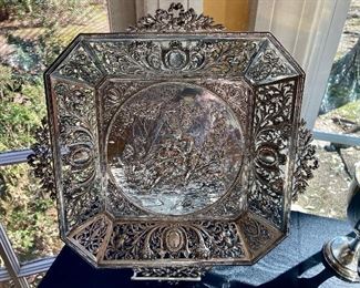 #47).  19th century German silver Repousse footed tray 
