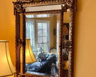 Antique Italian mirror.                 29” W. 50” H