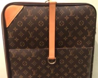 Louis Vuitton rolling luggage, unused