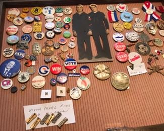 Vintage and antique pins and buttons, including political
