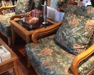Tapestry covered chairs with pillows