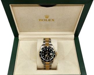 Rolex two submariner 18k/ss year 2000 in like new condition and comes with a one year warranty 