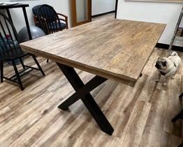 $350 USD     Rectangular Cross leg Rustic Wood Parsons Table RC122-32      Description: Sturday and understated dining table, perfect for your eat-in kitchen or dining room. Its crossed legs are connected by a single support beam for simple stability., The heavily grained wood top provides enough space to seat six comfortably. The black finish on the legs brings a stark and sleek touch to this earthy dining table, making it perfect for cottage-themed and contemporary aesthetics alike.

Dimensions: 60 x 35 x 30 in

Condition: In very good condition with only very minor signs of wear to be expected with use and age. 

Location: Local pick up during business hours Beaverton, OR 97008. 6th floor suite with elevator access. Contact us for shipper suggestions.     https://goodbyhello.com/products/rectangular-parsons-table-rc122-32?_pos=14&_sid=16455e41b&_ss=r