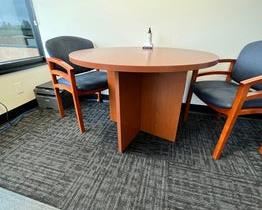 $400 USD      Preside Small Wood Round Conference Table RC122-29       Compatible with all HON desk lines, the Preside conference series is a broad, versatile solution for meetings and presentations. This Preside laminate conference table includes a 42" diameter round top and panel X-base, and comfortably seats up to four people. The compact, round shape is ideal for smaller spaces, including cafe settings. Laminate color is Mahogany; flat edge band color is Mahogany.

Comfortably accommodates up to four people while conserving floorspace
Laminate color is Mahogany; flat edge band color is Mahogany
Scratch-, spill- and stain-resistant laminate withstands heavy use
Heavy-grade, warp-resistant particleboard withstands heavy activity
Leveling glides compensate for uneven floors      https://goodbyhello.com/products/copy-of-veridesk-3-drawer-filing-cabinet-on-casters-rc122-28?_pos=9&_sid=d7a4d8c81&_ss=r