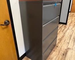 $750 USD     HON 4 Drawer Lateral Filing Cabinet Legal/Letter Dark Grey RC122-4      Description: HON four drawer 36"W lateral file is constructed of heavy gauge steel with a durable powder coat paint finish. Sleek outer case is fused to a nine-point steel grid frame that ensures proper drawer alignment.

Lateral file cabinet has an anti-tip mechanical interlock feature that keeps more than one drawer from opening at a time. Adjustable hang rails in each drawer accommodate letter or legal size file folders. Tamper resistant locks provide security. Cabinet meets ANSI/BIFMA safety standards. 

Topped with a light cherry finish with keys. 

Dimensions: 36"W x 19.25"D x 54.5"H

Location: Local pick up SW Portland, Oregon.

Condition: In excellent condition with only very minor signs of wear commensurate of light use.       https://goodbyhello.com/products/copy-of-hon-2-drawer-lateral-filing-cabinet-legal-letter-in-light-grey-rc121-3?_pos=30&_sid=d7a4d8c81&_ss=r