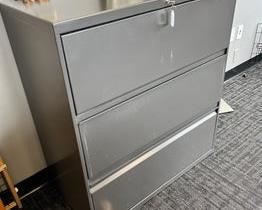 $300 USD     HON 3 Drawer Lateral Filing Cabinet Legal/Letter Dark Grey RC122-8      Description: HON four drawer 36"W lateral file is constructed of heavy gauge steel with a durable powder coat paint finish. Sleek outer case is fused to a nine-point steel grid frame that ensures proper drawer alignment.

Lateral file cabinet has an anti-tip mechanical interlock feature that keeps more than one drawer from opening at a time. Adjustable hang rails in each drawer accommodate letter or legal size file folders. Tamper resistant locks provide security. Cabinet meets ANSI/BIFMA safety standards. 

Dimensions: 36"W x 19.25"D x 42"H

Location: Local pick up SW Portland, Oregon.

Condition: In excellent condition with only very minor signs of wear commensurate of light use.      https://goodbyhello.com/products/copy-of-hon-4-drawer-lateral-filing-cabinet-legal-letter-in-dark-grey-rc121-6?_pos=29&_sid=d7a4d8c81&_ss=r