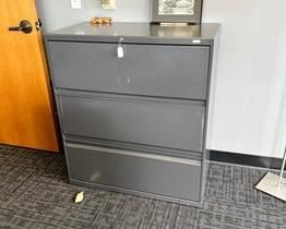$300 USD     HON 3 Drawer Lateral Filing Cabinet Legal/Letter Dark Grey RC122-8      Description: HON four drawer 36"W lateral file is constructed of heavy gauge steel with a durable powder coat paint finish. Sleek outer case is fused to a nine-point steel grid frame that ensures proper drawer alignment.

Lateral file cabinet has an anti-tip mechanical interlock feature that keeps more than one drawer from opening at a time. Adjustable hang rails in each drawer accommodate letter or legal size file folders. Tamper resistant locks provide security. Cabinet meets ANSI/BIFMA safety standards. 

Dimensions: 36"W x 19.25"D x 42"H

Location: Local pick up SW Portland, Oregon.

Condition: In excellent condition with only very minor signs of wear commensurate of light use.      https://goodbyhello.com/products/copy-of-hon-4-drawer-lateral-filing-cabinet-legal-letter-in-dark-grey-rc121-6?_pos=29&_sid=d7a4d8c81&_ss=r
