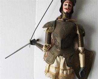Lot 23   6C/1910 Handmade Brass and Wood Italian Puppet of a Roman Soldier (figure is 24" tall) holding a sword and shield w/armor, includes heavy guide wires for control.  Condition:  Brass is turning dark, minor wear. 