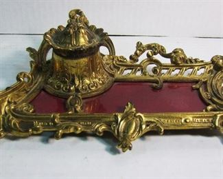 Lot 29   C/1890 French Louis 15th Gilt and Bronze Inkwell w/inset red glass section, 9 1/2" x 7" x 3" h.  Condition:  Minor wear to the gilt, no damage found. 