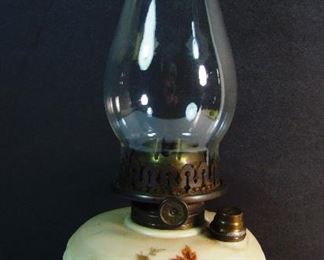 Lot 36    C/1890 Satin Quilted Glass Oil Lamp, floral transfer decorations, 14 1/2" h.  Condition:  Minor wear.