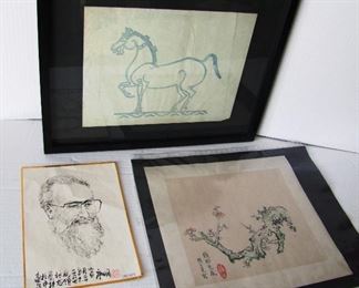 Lot 69   3 Piece Asian Art Group including:  19th C. Woodblock of a prancing horse in frame, 19" x 15" - 20th C. Woodblock of Apple Blossoms on a branch, 13" x 12 1/2" - Mid 20th C. Ink Drawing of Artist "Tang Ming" w/additional light portrait on reverse, 7 1/2" x 10 1/2".  Condition:  Horse print has vertical creases, no other damage found. 