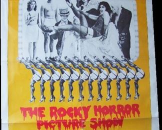 Lot 79   1975 Movie Poster "The Rocky Horror Picture Show", style "B", single sheet (27"x41"), sleeved.  Condition:  Shows shipping folds, small creases on edges and corners, missing 1/4" x 2" strip from left hand edge in middle.  