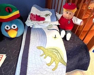 Twin dinosaur quilt bed cover, sham and matching sheets 