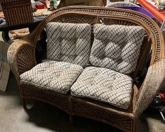 Very sturdy rattan and wicker settee and cushions