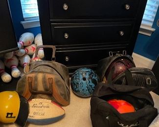 Bowling balls, bags, shoes and pins 