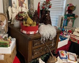 Pie of matching nightstands and lots of holiday decor 