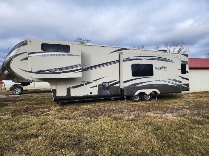 2014 Solitude 573 Travel 5th wheel RV By Grand Design. 38 feet and 16000 pounds in total.  Type S. This is in unbelievable condition and a must-see. New leather sofa and love seat reclining and an awesome fireplace 