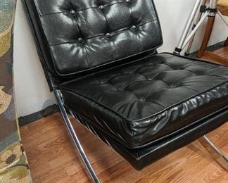 We are so excited about the mid-century chairs available at this auction. This tufted Barcelona, black leather and chrome chair from the 1970s is truly a standalone.
