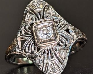 Diamond ring with intricate filigree
