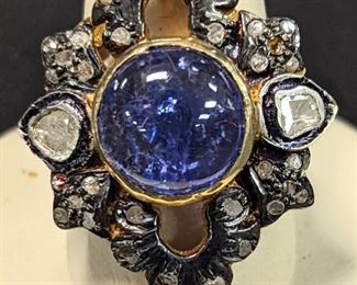 Unpolish diamond and blue sapphire ring cavachon center Stone