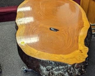 The top of the redwood heart slab table and very good shape for its age.