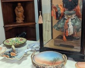 In the corner cabinet carved wooden Confucius and two in perfect condition mid-century planters and a second ceremonial Japanese doll