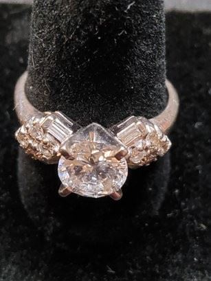 https://www.auctionninja.com/hewitt-estates-and-antiques/product/magnificent-diamond-engagement-ring-14-karat-white-gold--1278.html