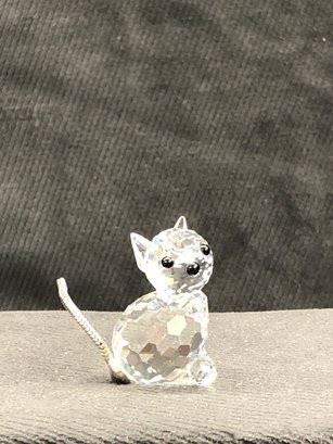 https://www.auctionninja.com/hewitt-estates-and-antiques/product/swarovski-mini-cat-crystal-1244.html