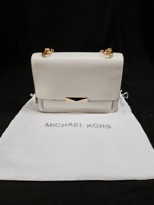 https://www.auctionninja.com/hewitt-estates-and-antiques/product/michael-kors-handbag-includes-dust-bag--1255.html