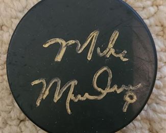 Hockey puck signed by Mike Modano 