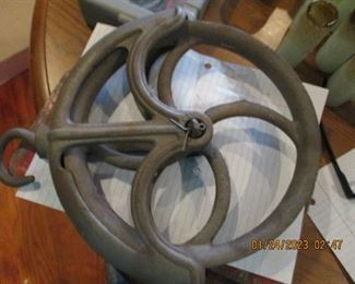 Old cast iron well pulley 