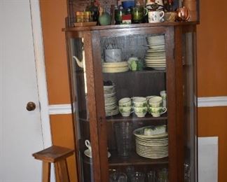 Beautiful Curved Glass China Cabinet loaded with Antiques and Collectibles