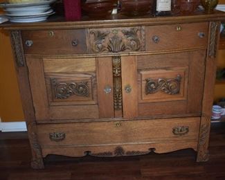 Gorgeous American Oak Chest Cabinet with 3 keylock upper drawers, Cabinet Doors, and Lower Locking Drawer Beautifully Carved Designs with Lions Head between Cabinet Doors and Glass Knobs