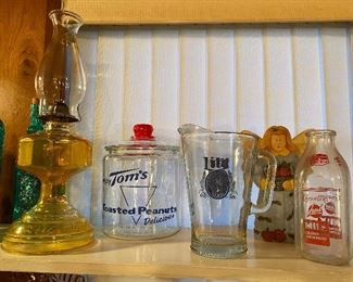 Vintage oil lamp, Tom's peanut jar, Miller Lite pitcher, Carnation milk bottle