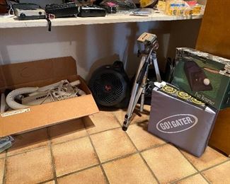 Oreck vacuum, tripod, golf game, etc.