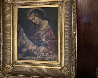 framed Virgin Mary painting