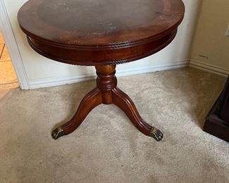 round, three-footed table