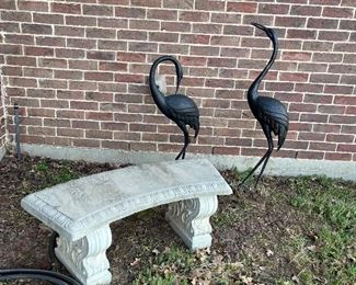 concrete bench and garden cranes
