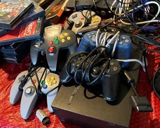 vintage video game consoles and controllers 