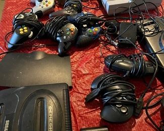 vintage video game consoles and controllers 